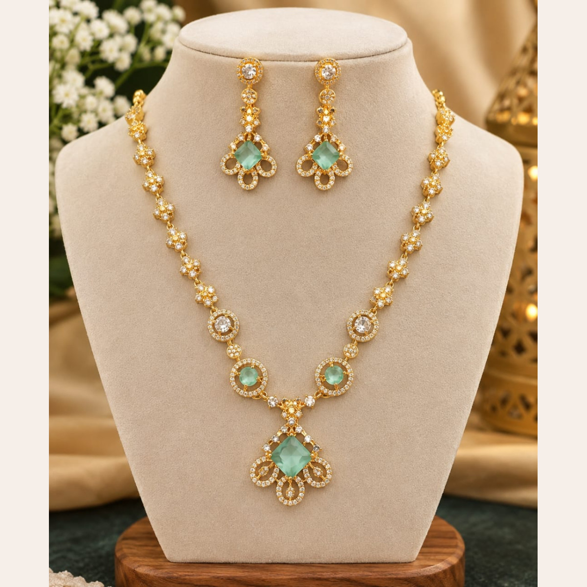 Mint green stone necklace set with matching earrings.
